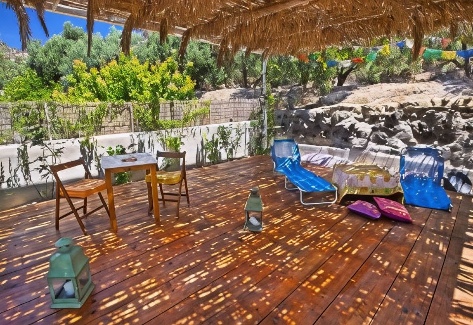 Hotel Natura Cottages, Exterior, Garden