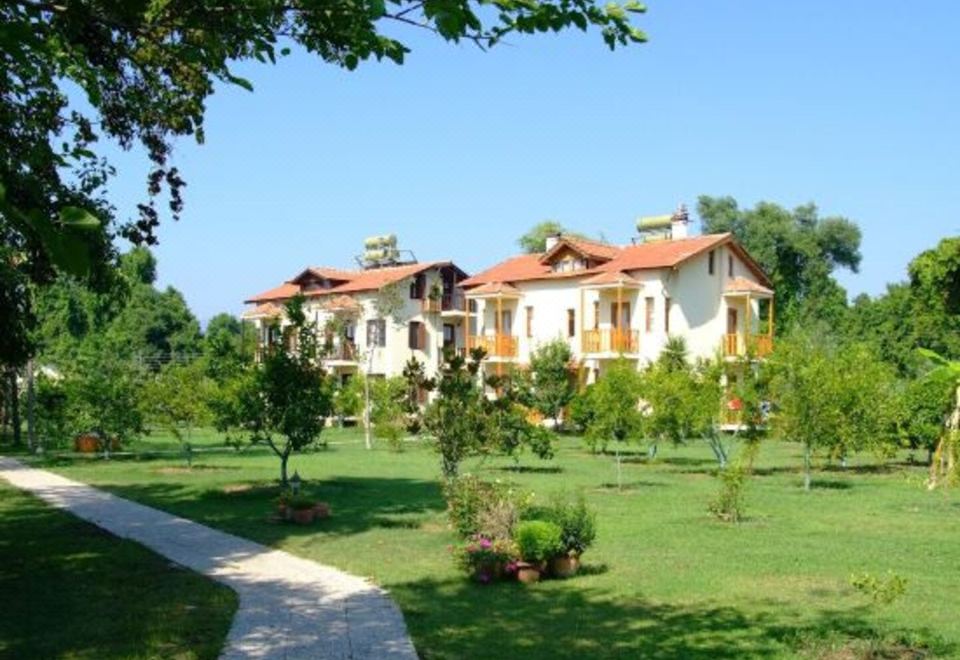 Hotel Yonca Lodge, Exterior, Garden